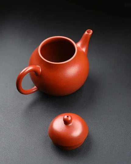 Elegant Purple Clay Teapot with Golden Accents for Refined Tea Enjoyment