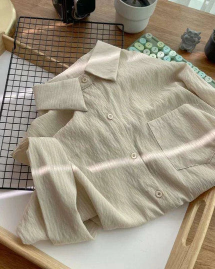 Loose-Fitting Women's Pleated Long-Sleeve Shirt with Pockets - Versatile Solid Color Sunscreen Top