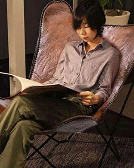 Vintage Brown Leather Butterfly Chair - Stylish Versatile Seating Addition