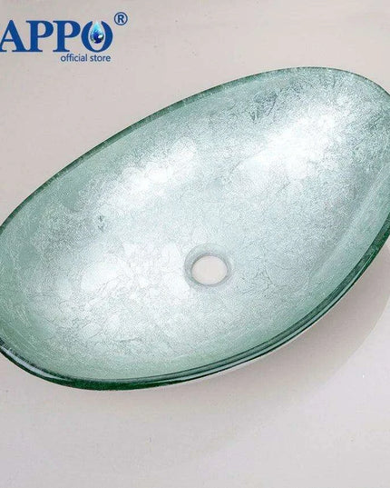 Sleek Chrome Faucet and Oval Glass Sink Ensemble with Pop-Up Drain Assembly