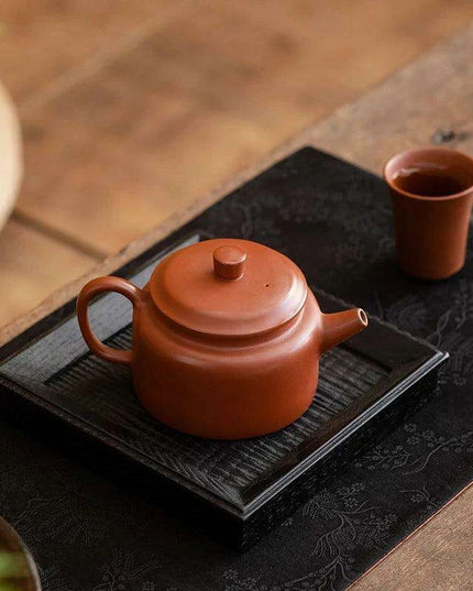 Authentic Artisan Yixing Purple Clay Teapot with Built-In Strainer for a Premium Puer Tea Experience