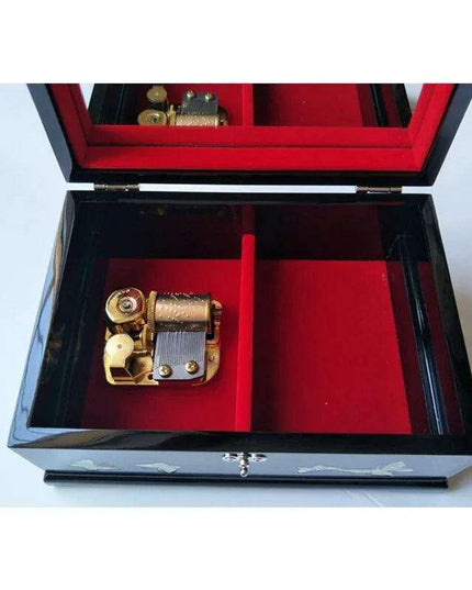 Charming Musical Jewelry Box with Pearl Inlays and Floral Elegance