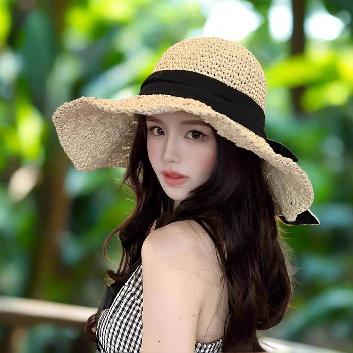 Elegant Women's Travel-Friendly Straw Sun Hat with Wide Brim for Enhanced Summer Protection