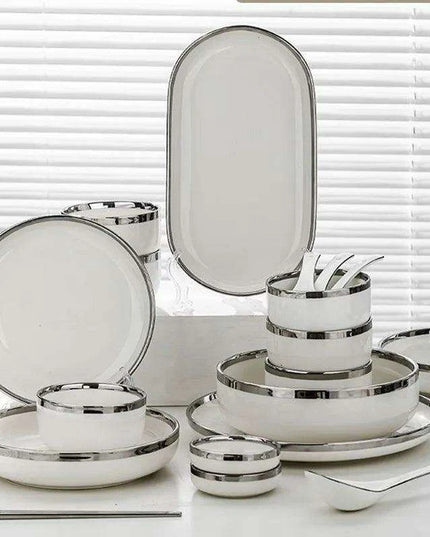 Sophisticated Elegance: White Ceramic Dinnerware Set with Silver Trim