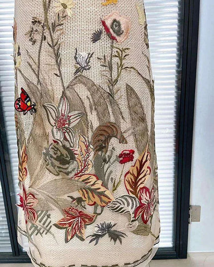 Sophisticated Sleeveless Midi Dress with Luxurious Embroidery