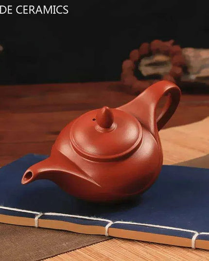 Artisan Yixing Zisha Teapot Set – Elegant Purple Clay Brew Kit for Home and Travel
