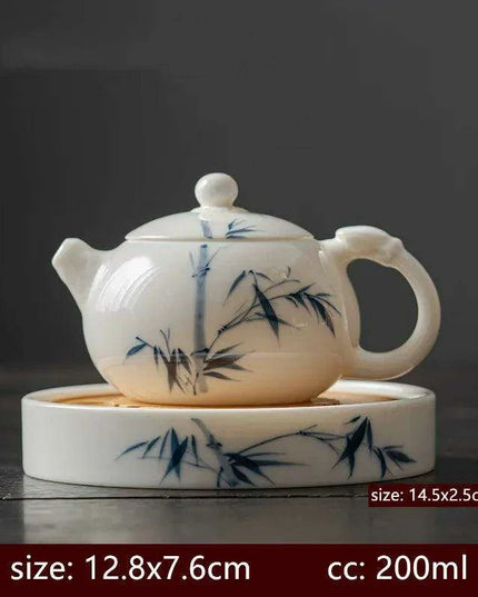 Artisan Xishi Tea Experience: Exquisite Hand-Painted Teapot Set with Premium Filter