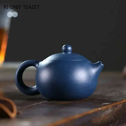 Elegant Yixing Purple Clay Teapot – 100ml with Unique Ball Filter for Authentic Zisha Tea Experience
