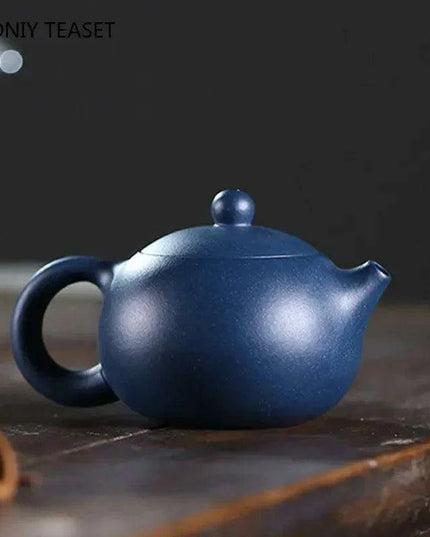 Elegant Yixing Purple Clay Teapot – 100ml with Unique Ball Filter for Authentic Zisha Tea Experience
