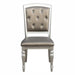 Glistening Silver Dining Ensemble with Crystal-Accented Tufted Chairs