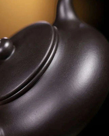 Handcrafted 140ml Yixing Purple Clay Teapot - Exquisite Zisha Kettle for Passionate Tea Aficionados