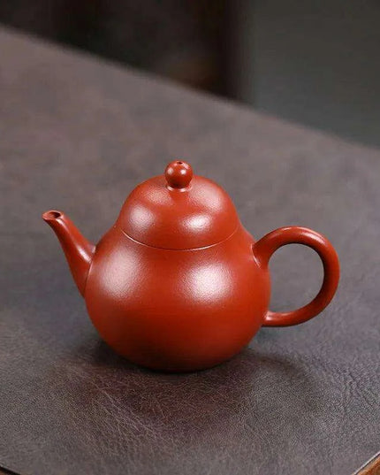 Elegant Purple Clay Teapot with Golden Accents for Refined Tea Enjoyment