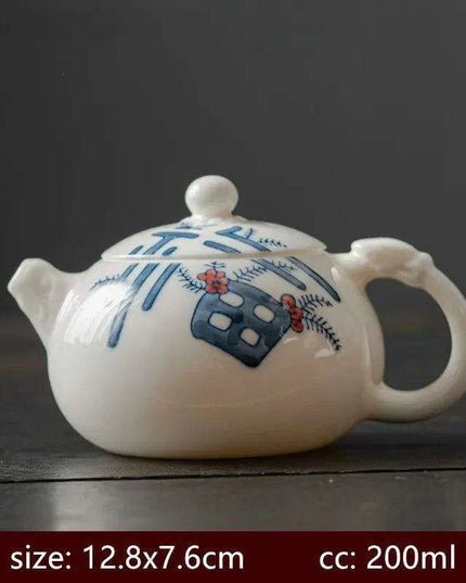 Artisan Xishi Tea Experience: Exquisite Hand-Painted Teapot Set with Premium Filter
