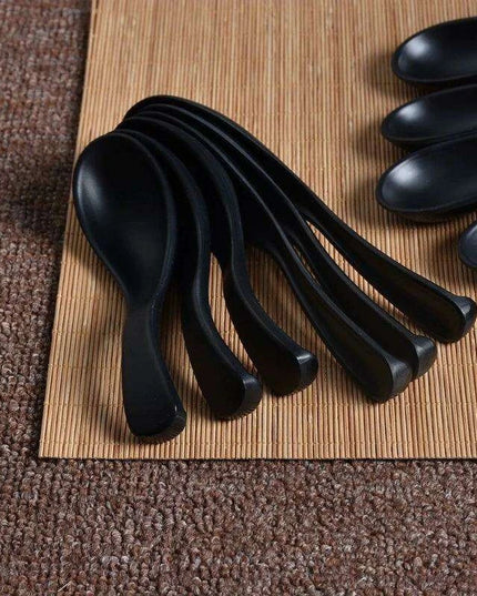 Sophisticated Black Melamine Serving Spoon with Elegant Japanese Porcelain Motif
