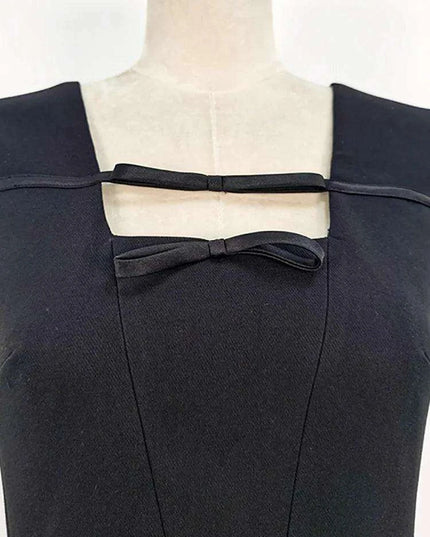 Elegant Black Sleeveless Evening Dress with Bow Detail and High Slit