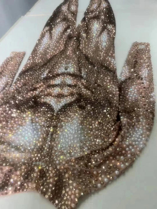 Glamorous Night Out: Men's Rhinestone and Pearl Jumpsuit for Unforgettable Style