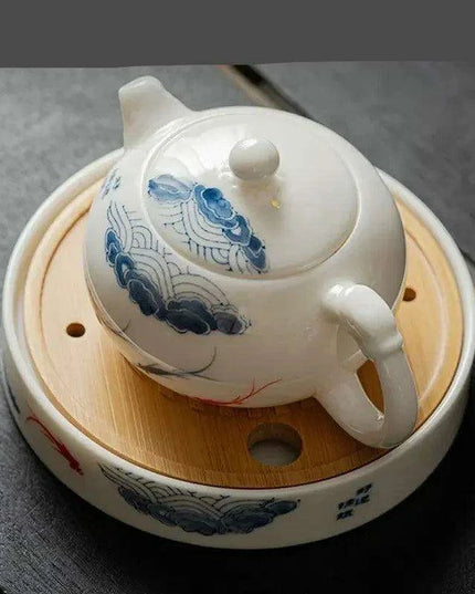 Artisan Xishi Tea Experience: Exquisite Hand-Painted Teapot Set with Premium Filter