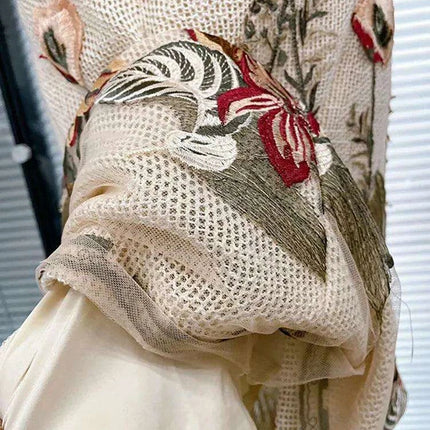 Sophisticated Sleeveless Midi Dress with Luxurious Embroidery