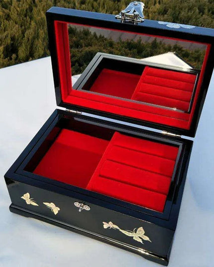 Charming Musical Jewelry Box with Pearl Inlays and Floral Elegance