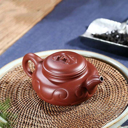 Artisan 180ml Yixing Purple Clay Teapot with Integrated Filter – Luxurious Zisha Infuser for Exceptional Tea Experiences