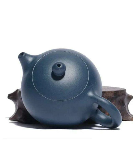 Elegant Yixing Purple Clay Teapot – 100ml with Unique Ball Filter for Authentic Zisha Tea Experience