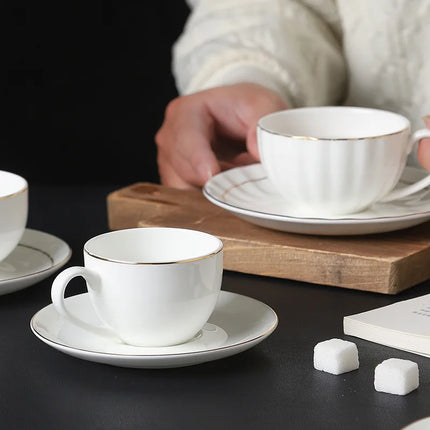 Gold-Rimmed Bone China Coffee Cup & Saucer Set | Très Elite