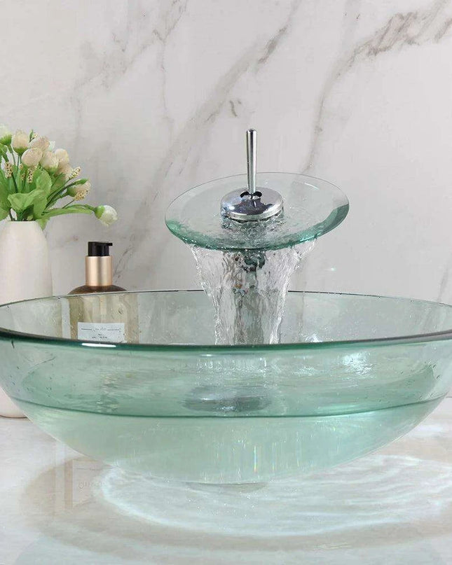 Elegant Blue Glass Vessel Sink Ensemble with Waterfall Faucet