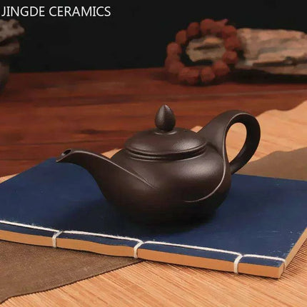 Artisan Yixing Zisha Teapot Set – Elegant Purple Clay Brew Kit for Home and Travel