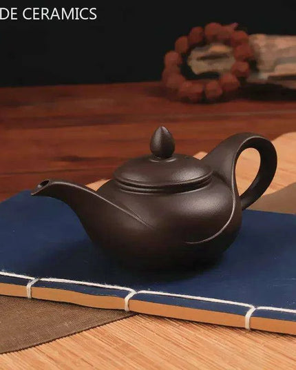 Artisan Yixing Zisha Teapot Set – Elegant Purple Clay Brew Kit for Home and Travel