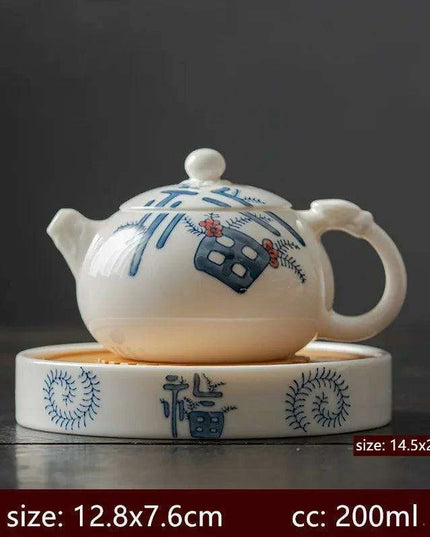 Artisan Xishi Tea Experience: Exquisite Hand-Painted Teapot Set with Premium Filter
