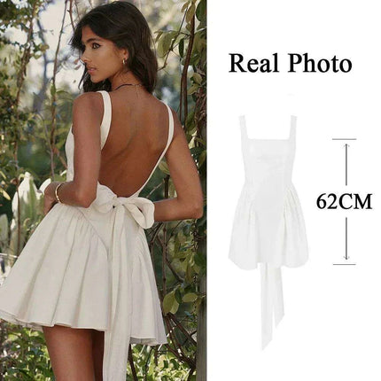 Elegant White Cotton Backless Dress with Oversized Bow - Effortless Sophistication for Any Occasion