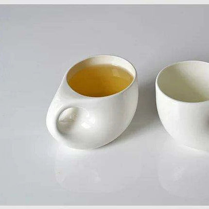 Elegant Ceramic Tea and Coffee Set with Water Drop Design