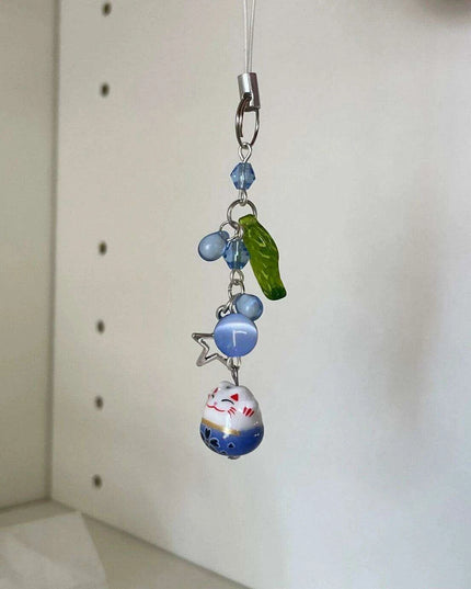 Charming Blue Cat Guardian Phone Accessory | Artisan Keychain with Leaf Detail