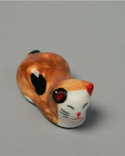 Playful Cat Cutlery and Chopstick Holder for a Whimsical Kitchen
