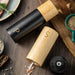 7-Inch Elegant Salt and Pepper Grinder Duo with Sleek Wooden Stand - Elevate Your Dining Ambiance