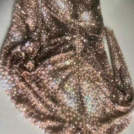 Glamorous Night Out: Men's Rhinestone and Pearl Jumpsuit for Unforgettable Style