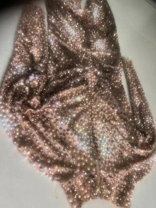 Glamorous Night Out: Men's Rhinestone and Pearl Jumpsuit for Unforgettable Style