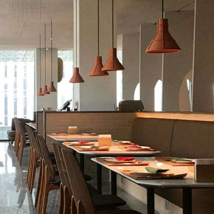 Retro-Inspired Orange Concrete Pendant Light for Contemporary Interiors