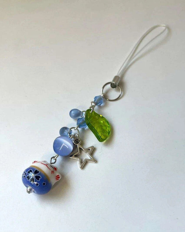 Charming Blue Cat Guardian Phone Accessory | Artisan Keychain with Leaf Detail