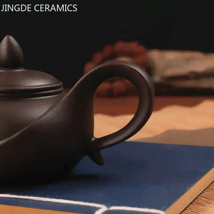Artisan Yixing Zisha Teapot Set – Elegant Purple Clay Brew Kit for Home and Travel