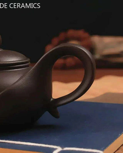 Artisan Yixing Zisha Teapot Set – Elegant Purple Clay Brew Kit for Home and Travel