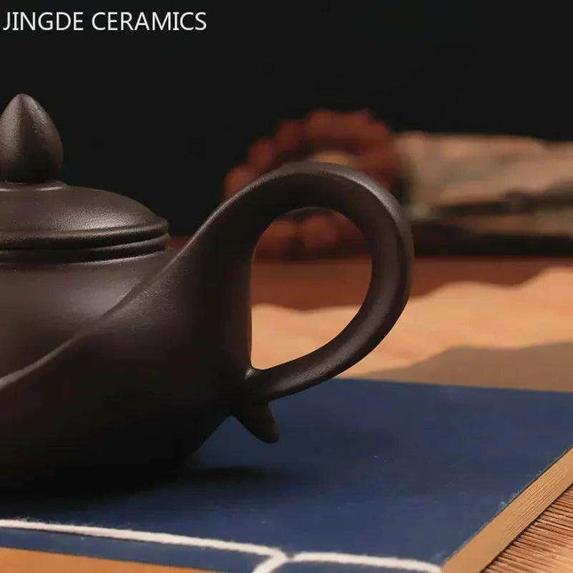 Artisan Yixing Zisha Teapot Set – Elegant Purple Clay Brew Kit for Home and Travel