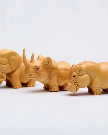 Handcrafted Wooden Wildlife Figurines: Distinctive Rhino, Hippo, and Elephant Decor for Home and Travel