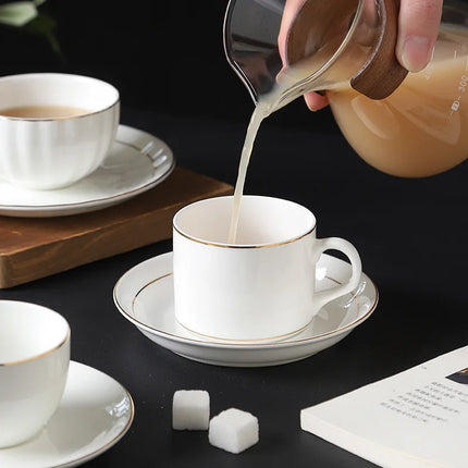Gold-Rimmed Bone China Coffee Cup & Saucer Set | Très Elite