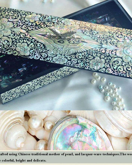 Artisan Crafted Mother of Pearl Crane Jewelry Compendium with Elegant Black Wood Accents