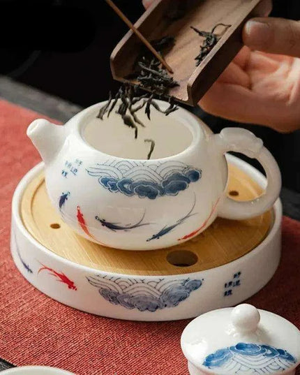 Artisan Xishi Tea Experience: Exquisite Hand-Painted Teapot Set with Premium Filter