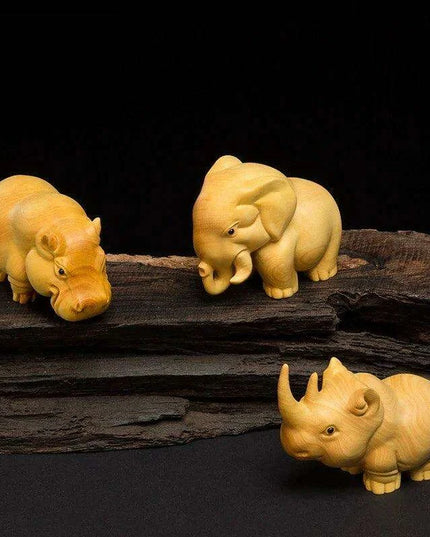 Handcrafted Wooden Wildlife Figurines: Distinctive Rhino, Hippo, and Elephant Decor for Home and Travel