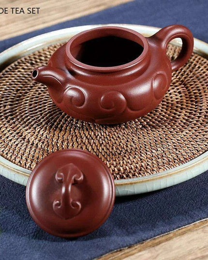 Artisan 180ml Yixing Purple Clay Teapot with Integrated Filter – Luxurious Zisha Infuser for Exceptional Tea Experiences