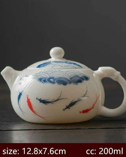 Artisan Xishi Tea Experience: Exquisite Hand-Painted Teapot Set with Premium Filter