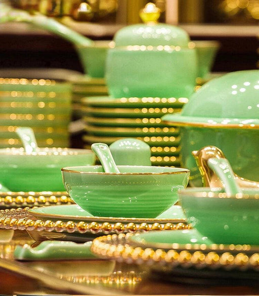Sophisticated Blue and White Porcelain Dinnerware Set with Opulent Gold Accents